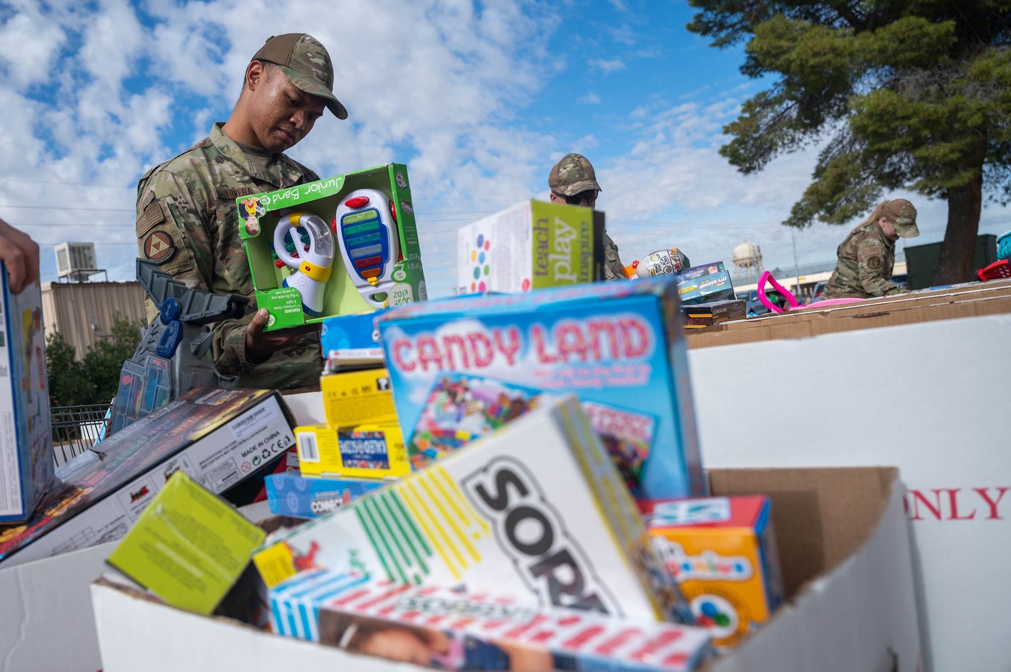 56th Fighter Wing Airmen search for toys at a Toys for Tots event Dec. 21-22, 2023, at Luke Air Force Base, Arizona.