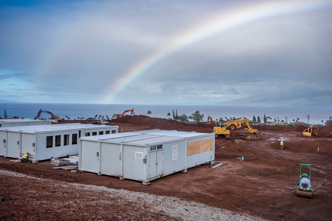 A rainbow forms near the temporary replacement campus for King Kamehameha III Elementary School, Dec. 16, 2023 in Lahaina, Hawaii.