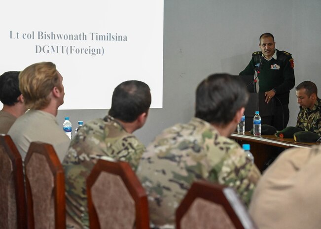 Lt. Col. Bishwonath Timilsina, Director General of Military Training (Foreign), Nepali Army, delivers closing remarks as part of a U.S. and Nepal subject matter expert exchange at Ganesh Kashya, the Nepali Army headquarters in Kathmandu, Nepal. Naval Special Warfare trains with forces worldwide to improve and further specialize skills required to conduct missions and respond to crises. (U.S. Navy photo by Mass Communication Specialist 1st Class Chelsea D. Meiller)