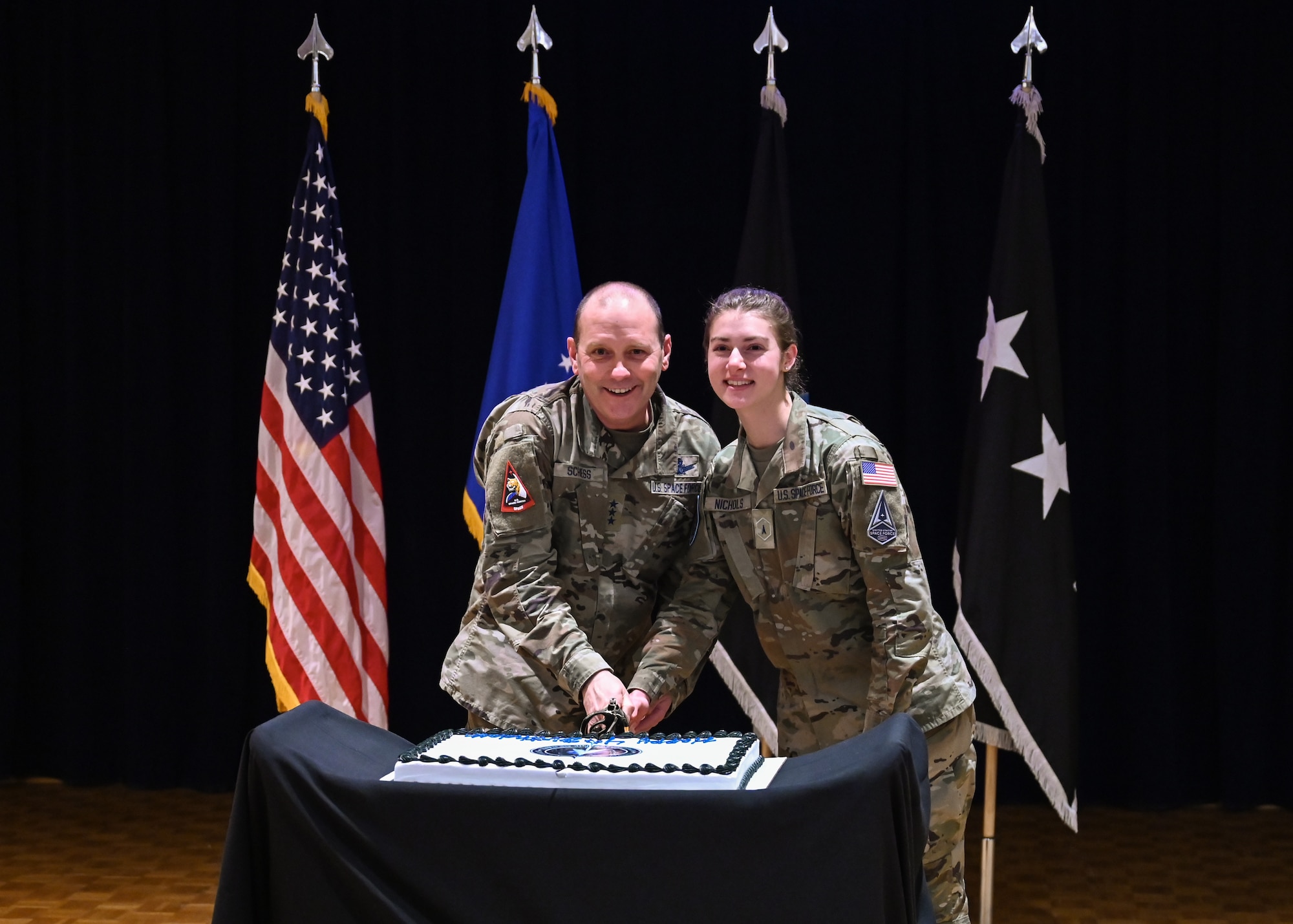 United States Space Force Lt. Gen. Douglas Scheiss, U.S. Space Forces- Space commander, and United States Space Force Spc1 Morgan Nichols, 533rd Training Squadron student, cut a cake during the Space Force's fourth birthday celebration at Vandenberg Space Force Base.