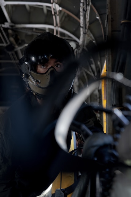 U.S. Marine Corps Sgt. Rachel Myers, a crew chief with Marine Heavy Helicopter Squadron (HMH) 361, Marine Aircraft Group 16, 3rd Marine Aircraft Wing, performs preflight checks in a CH-53E Super Stallion at Marine Corps Air Station, California, Dec. 13, 2023. As a crew chief, Myers communicates with pilots about in-flight instructions, alerts to any obstacles not visible from the pilot's point of view and works within the maintenance department where they inspect, service, maintain, and repair helicopters. (U.S. Marine Corps photo by Lance Cpl. Samantha Devine)