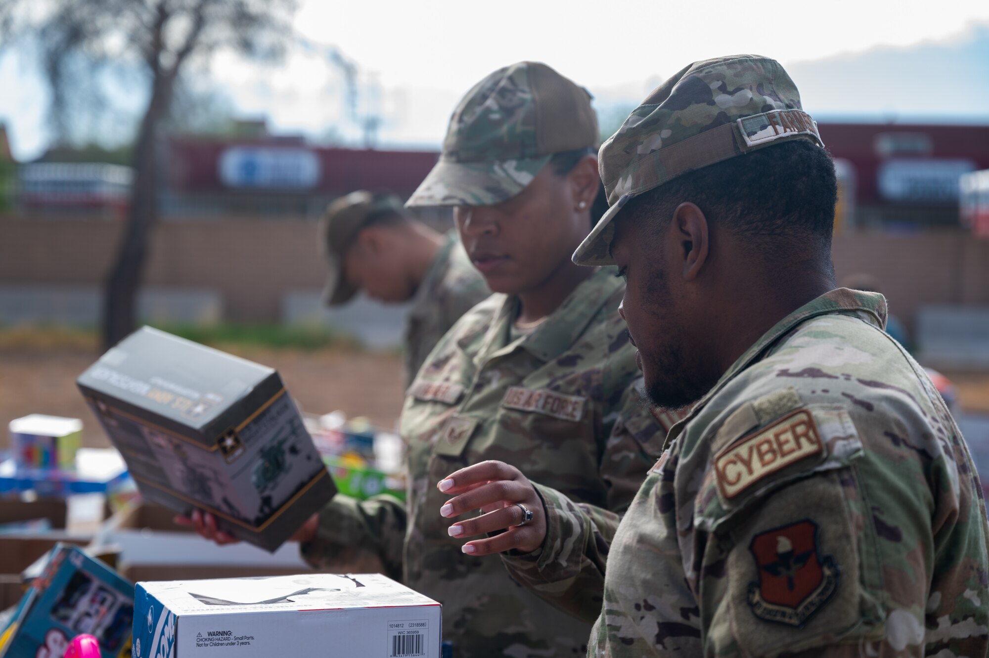 56th Fighter Wing Airmen search for toys at a Toys for Tots event Dec. 21-22, 2023, at Luke Air Force Base, Arizona.