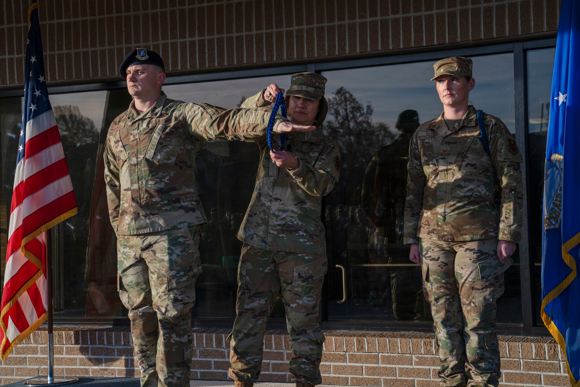 Chief Master Sgt. of the Air Force JoAnne S. Bass conducts an End of Watch’ retiring of the aiguillette ceremony on Keesler Air Force Base, Mississippi, Dec. 19, 2023.