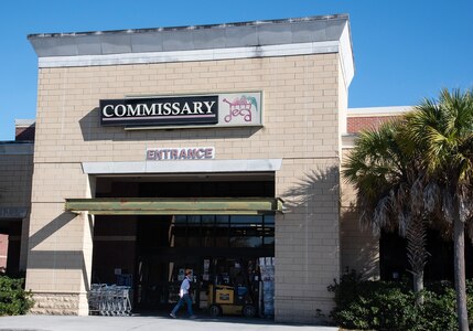 315 AW recruiters help spread holiday cheer at commissary