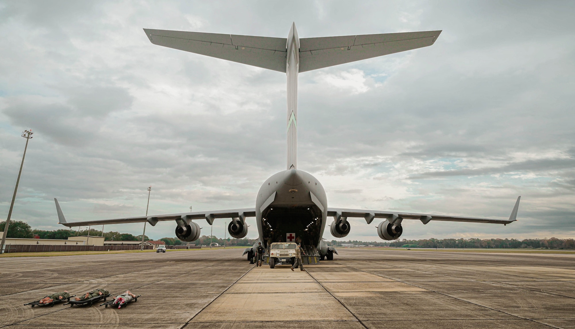 members prepare to load an aircraft
