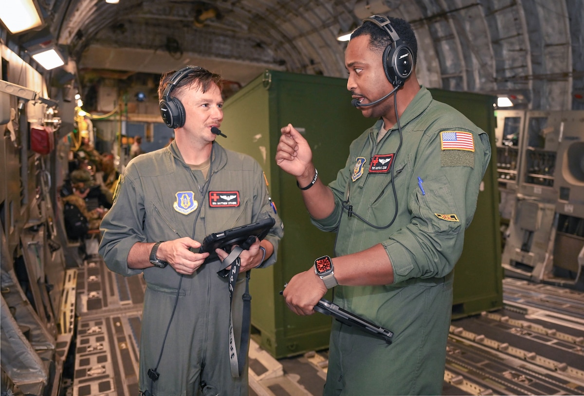 two members discuss components