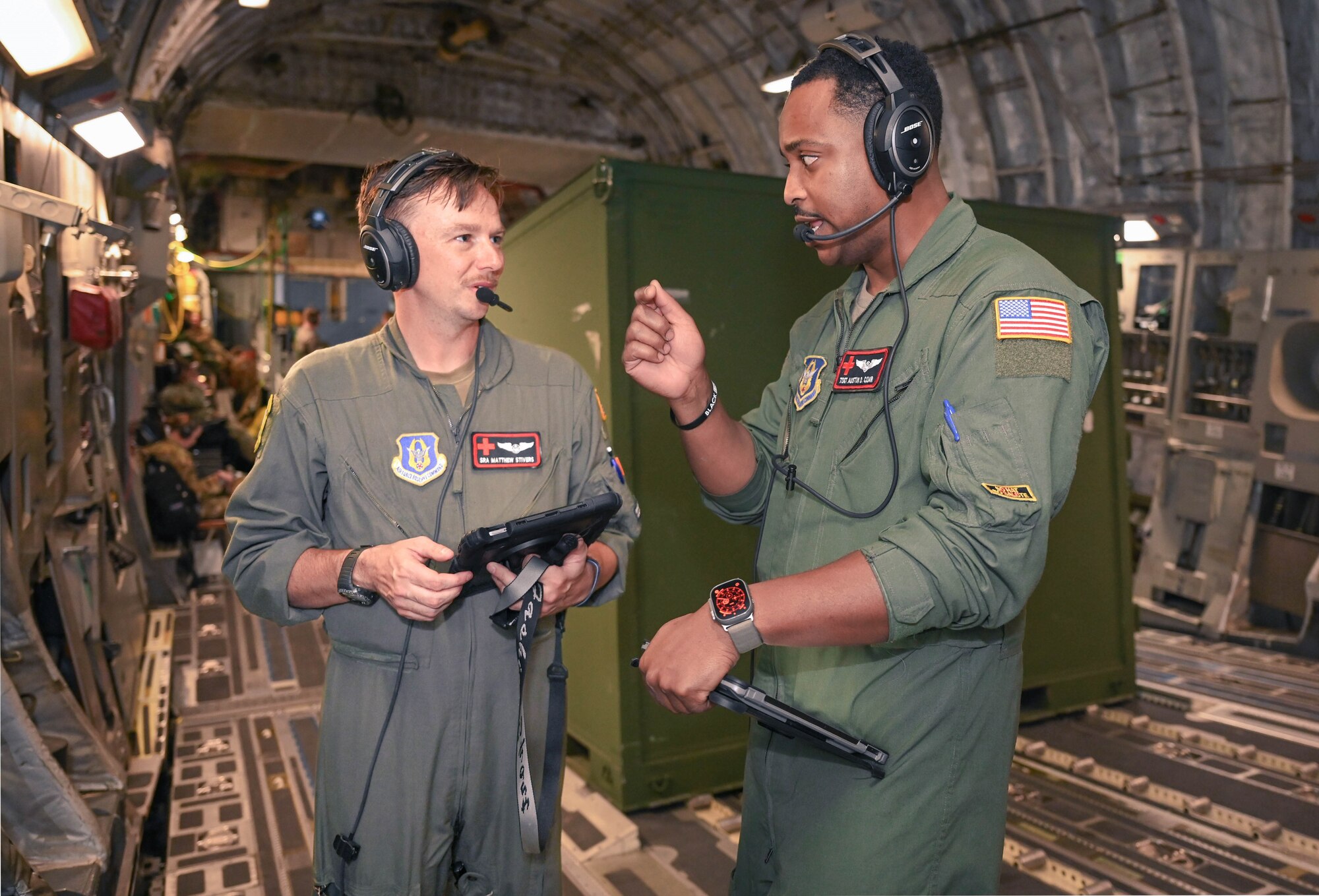 two members discuss components