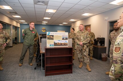 Airmen touring facility.