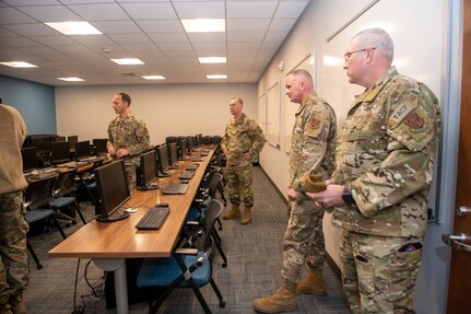 Airmen touring computer lab.