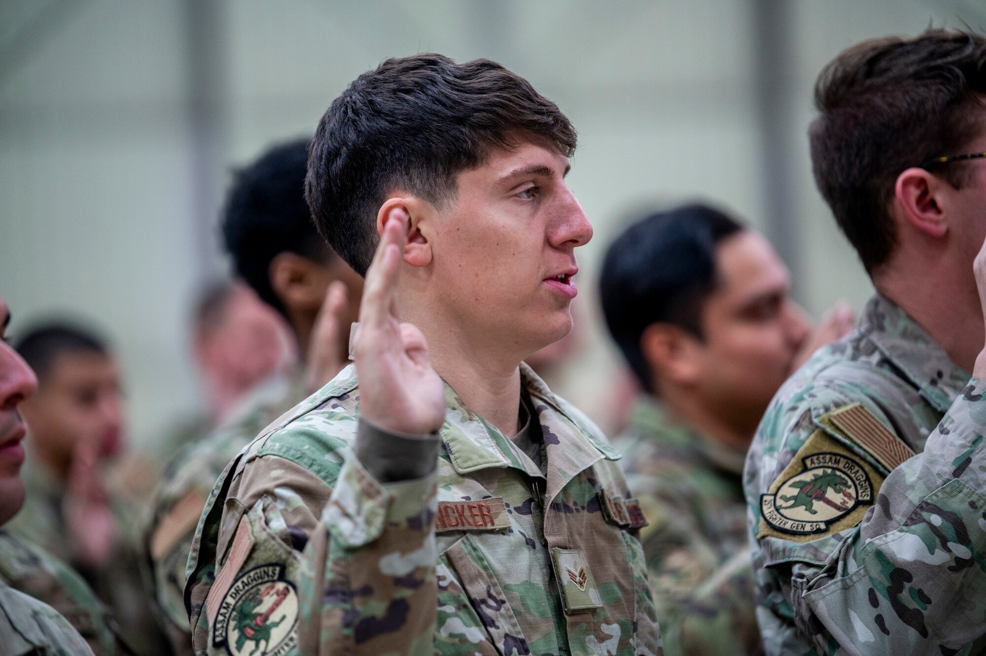 U.S. Air Force Senior Airman Mitch Yuncker, 25th Fighter Generation Squadron crew chief, recites the Crew Chief Oath during the 25th FGS Dedicated Crew Chief Ceremony at Osan Air Base, Republic of Korea, Dec. 19, 2023.