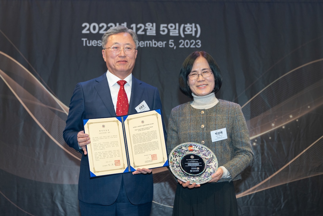 Accepting the 21st KAA Friendship Award on behalf of the late Maj. Gen. Joseph P. Cleland and his late wife Florence Emily Cadotte Cleland was Sang-ye Park, principal of Gapyeong High School.