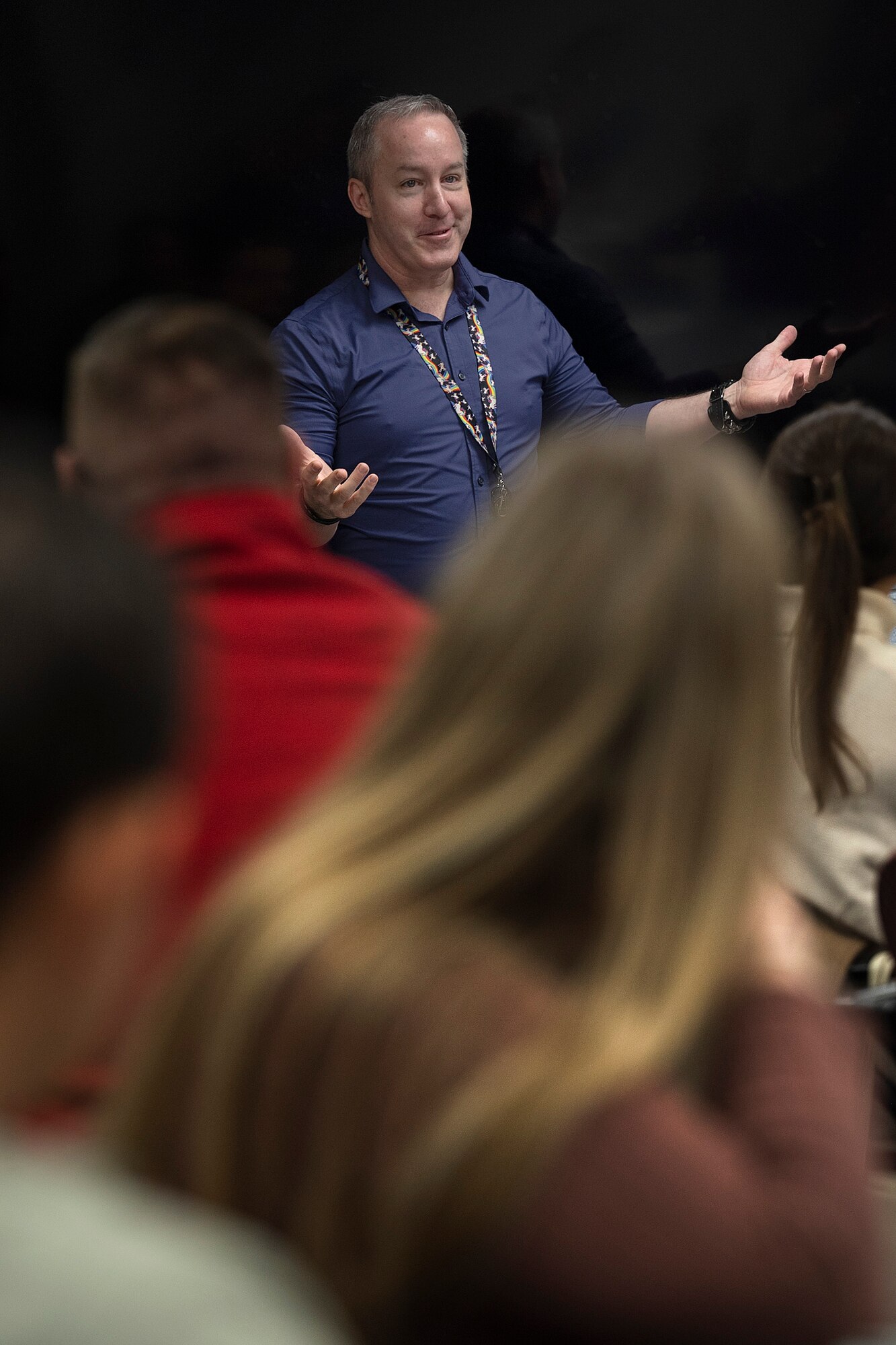 Instructor briefs classroom.