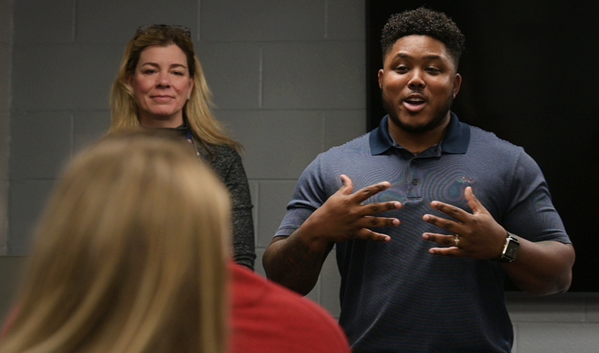 Student presents brief to classroom.