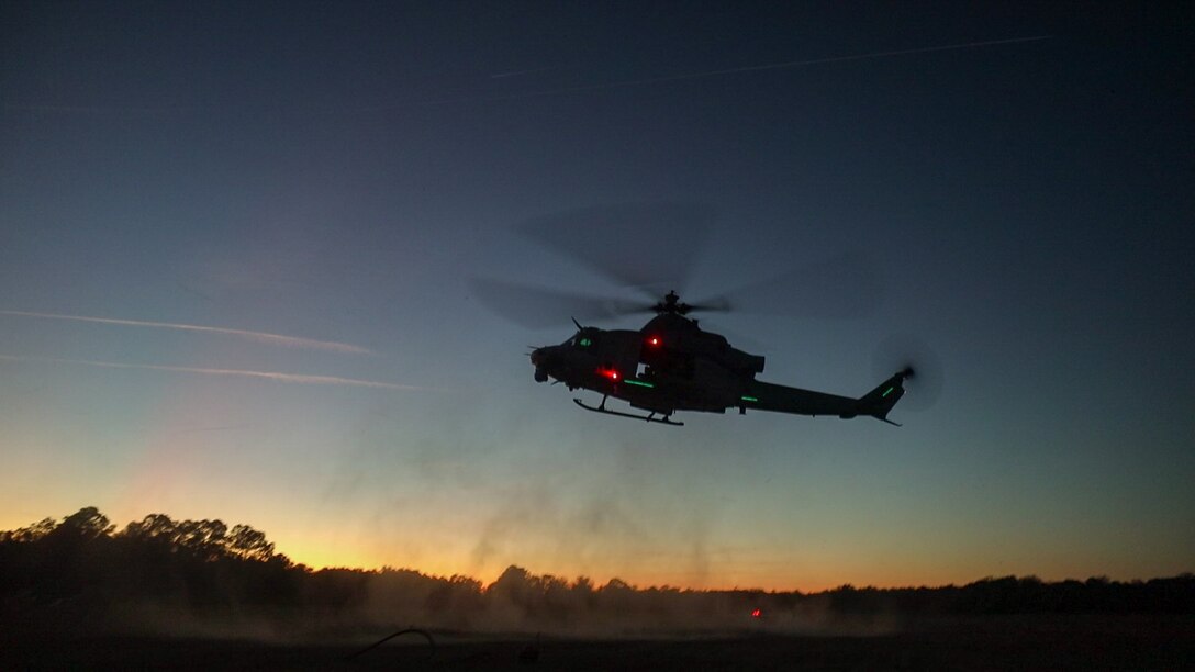 A U.S. Marine Corps UH-1Y Venom, assigned to Marine Light Attack Helicopter Squadron (HMLA) 167, prepares to land during Operation Potomac Enforcer at Landing Zone Bluebird, Marine Corps Base Camp Lejeune, North Carolina, Dec. 7, 2023. Operation Potomac Enforcer allowed Marine Wing Support Squadron (MWSS) 272 to exercise various aviation ground-support capabilities, including forward-arming and refueling operations in support of 2nd Marine Aircraft Wing (MAW) aviation squadrons. HMLA-167 and MWSS-272 are subordinate units of 2nd MAW, the aviation combat element of II Marine Expeditionary Force. (U.S. Marine Corps photo by Lance Cpl. David Ornelas-Baeza)