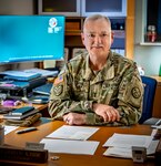 Maj. Gen. William "Bill" Crane, Adjutant General for the West Virginia National Guard, poses for a candid portrait at his desk, December 18, 2023, at Joint Forces Headquarters in Charleston, West Virginia. As the Adjutant General for the State of West Virginia, he provides command guidance and vision to the West Virginia Army and Air National Guard's more than 6,800 Citizen Soldiers, Airmen, and civilians employed through the West Virginia Military Authority. He provides the overall supervision of the day-to-day operations and management of the readiness, fiscal, personnel, equipment and real property resources of the agency. (U.S. Army National Guard photo by Edwin L. Wriston)