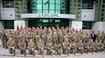 Participants at the Army Reserve Medical Command's Senior Leader Forum pose Dec. 2, 2023, in front of the C. W. Bill Young Armed Forces Reserve Center, Pinellas Park, Fla. The 