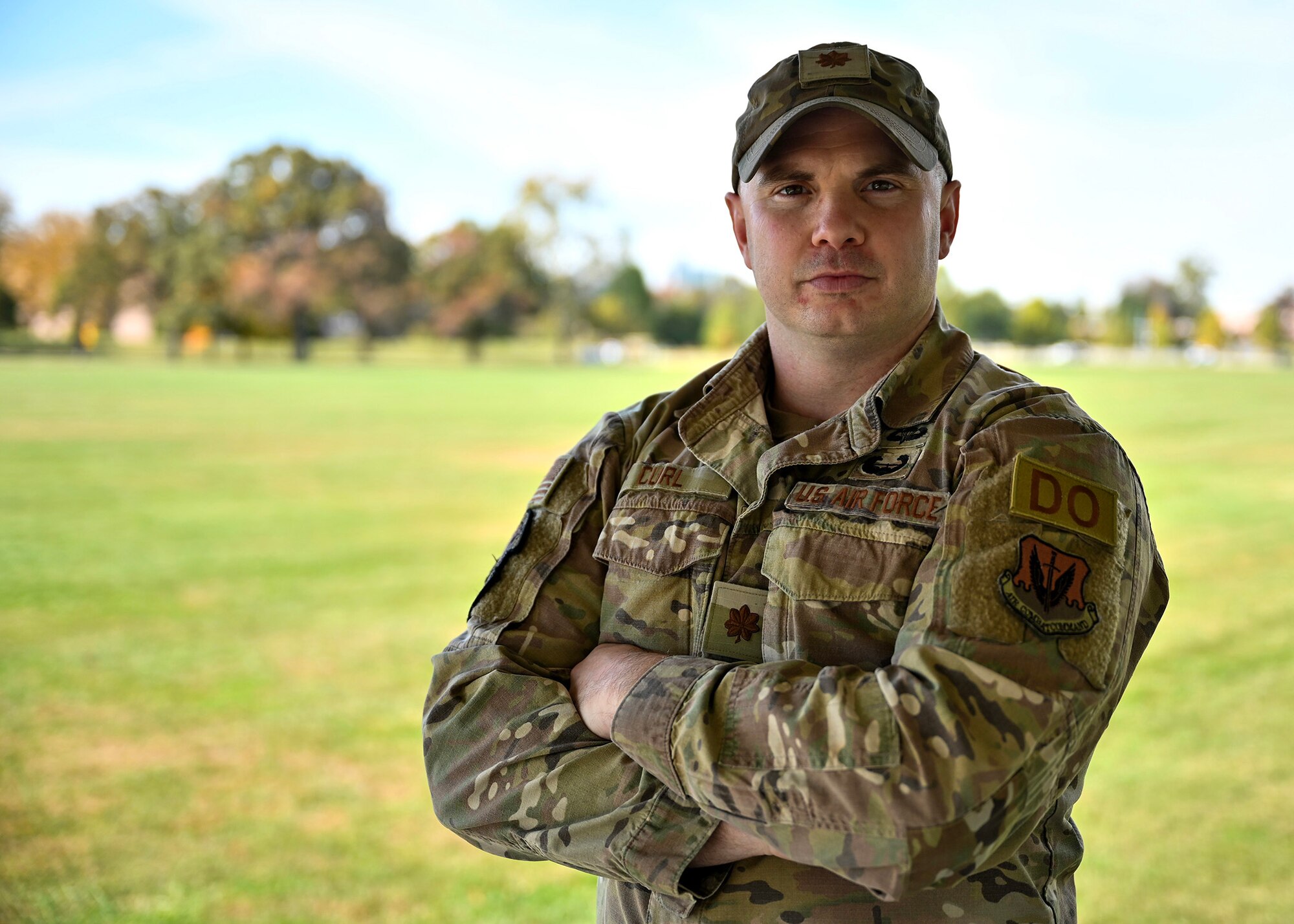 U.S. Air Force Maj. Nathan Curl, 29th Intelligence Squadron director of operations, strikes a pose for a photo Oct. 26, 2023, at Fort George G. Meade, Maryland. Curl was a college cheerleader for three years before transitioning to military service and chose to carry on with his passion. (U.S. Air Force photo by Tech. Sgt. Kevin Iinuma)