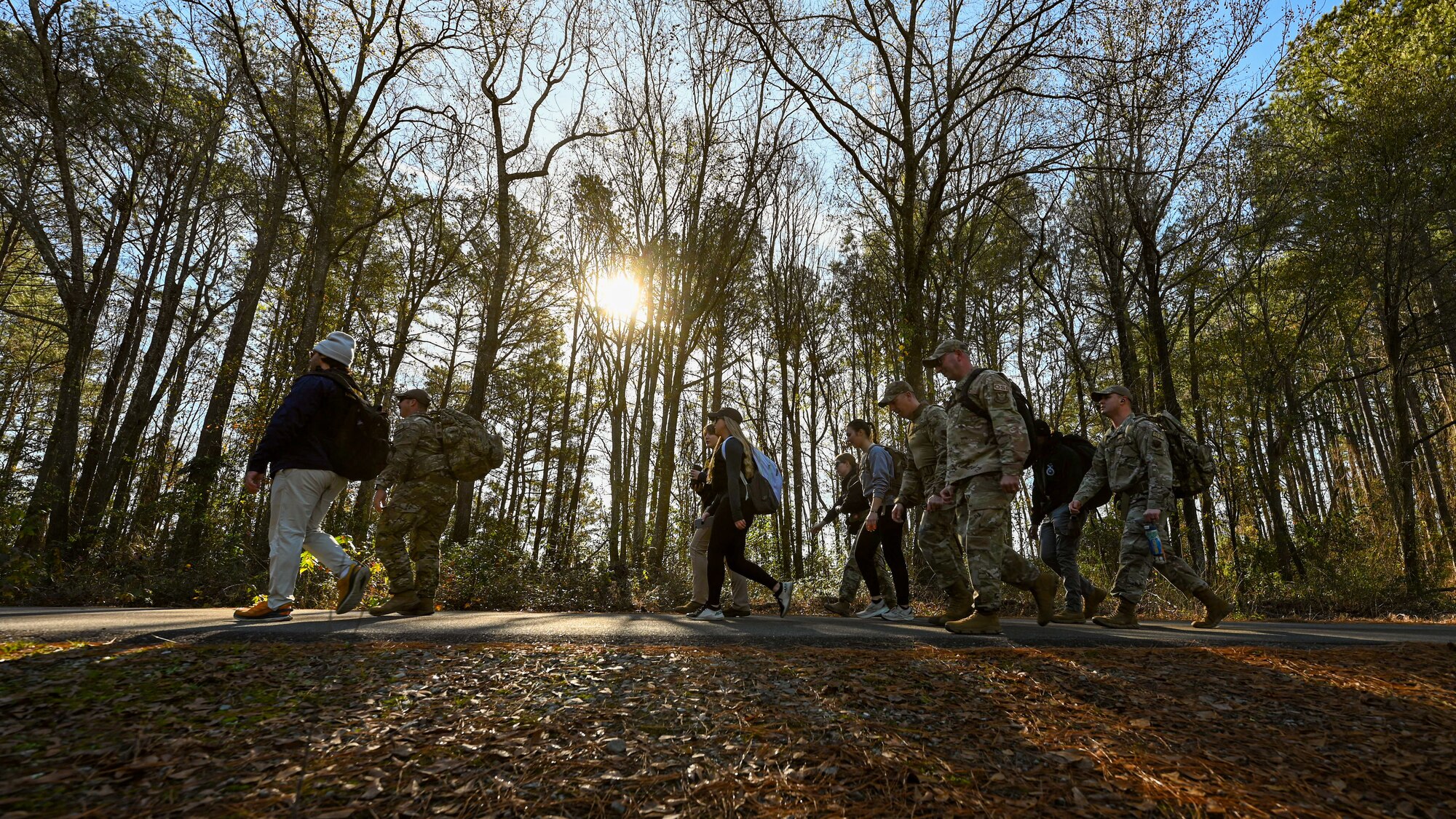 U.S. Airmen assigned to the 4th Security Forces Squadron and Office of Special Investigations Detachment 216 participate in a Hustler 6 memorial ruck at Seymour Johnson Air Force Base, North Carolina on Dec 21, 2023.This annual event honors four OSI special agents and two Security Forces defenders that lost their lives during a mission near Bagram, Afghanistan on Dec. 21, 2015. (U.S. Air Force photo by Senior Airman Sabrina Fuller-Judd)