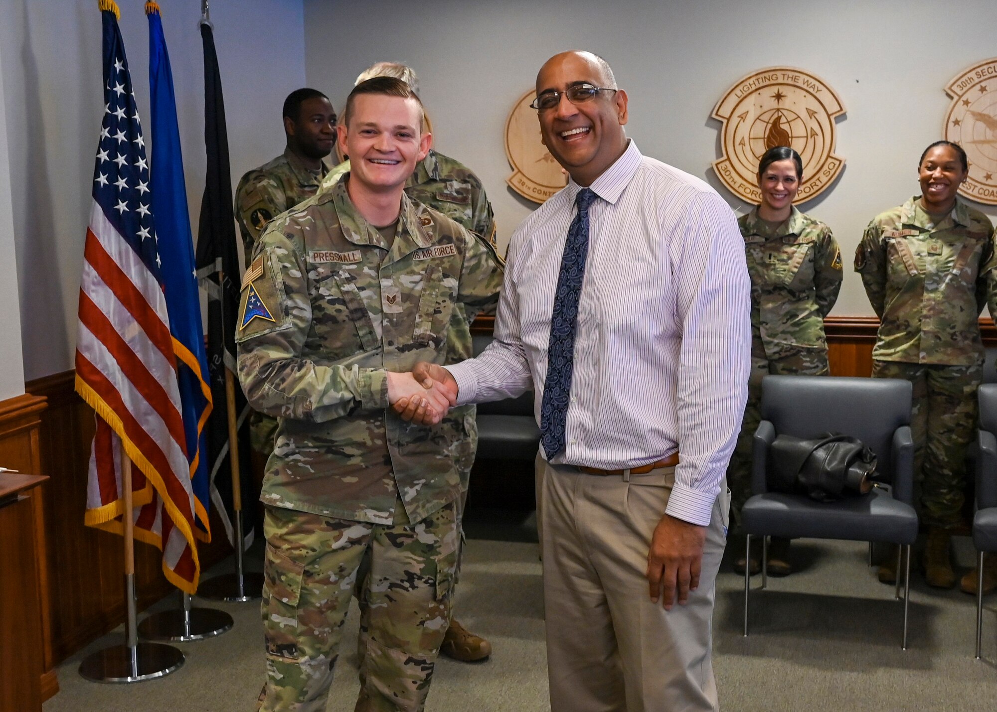 30th Chaplain Corps readiness and training NCOIC, and Dr. Ravi Chaudhary, Air Force for Energy, Installations and Environment assistant secretary, poses with the Assistant Secretary for the Air Force for Energy, Installations and Environment, during his tour at Vandenberg Space Force Base.