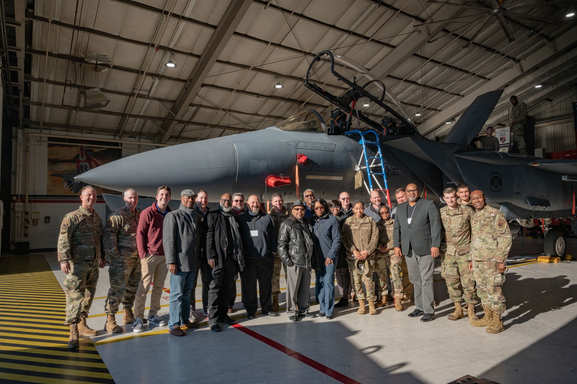 Religious leaders from surrounding communities pose for a group photo during Clergy Day 2023  to Seymour Johnson Air Force Base, North Carolina, Dec. 7, 2023. The visit was part of an annual base chapel event called Clergy Day, which is designed to strengthen ministry partnerships with nearby faiths and to expand spiritual support and services for Airmen. (U.S. Air Force Photo By Airman 1st Class Rebecca Sirimarco-Lang)