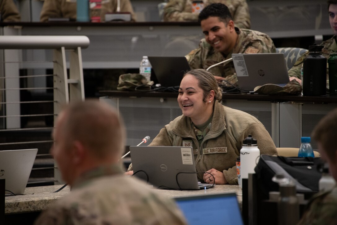 U.S. Air Force Tech. Sgt. Shondelle Berking, 316th Medical Group flight chief, laughs during the First Sergeant Symposium at Joint Base Andrews