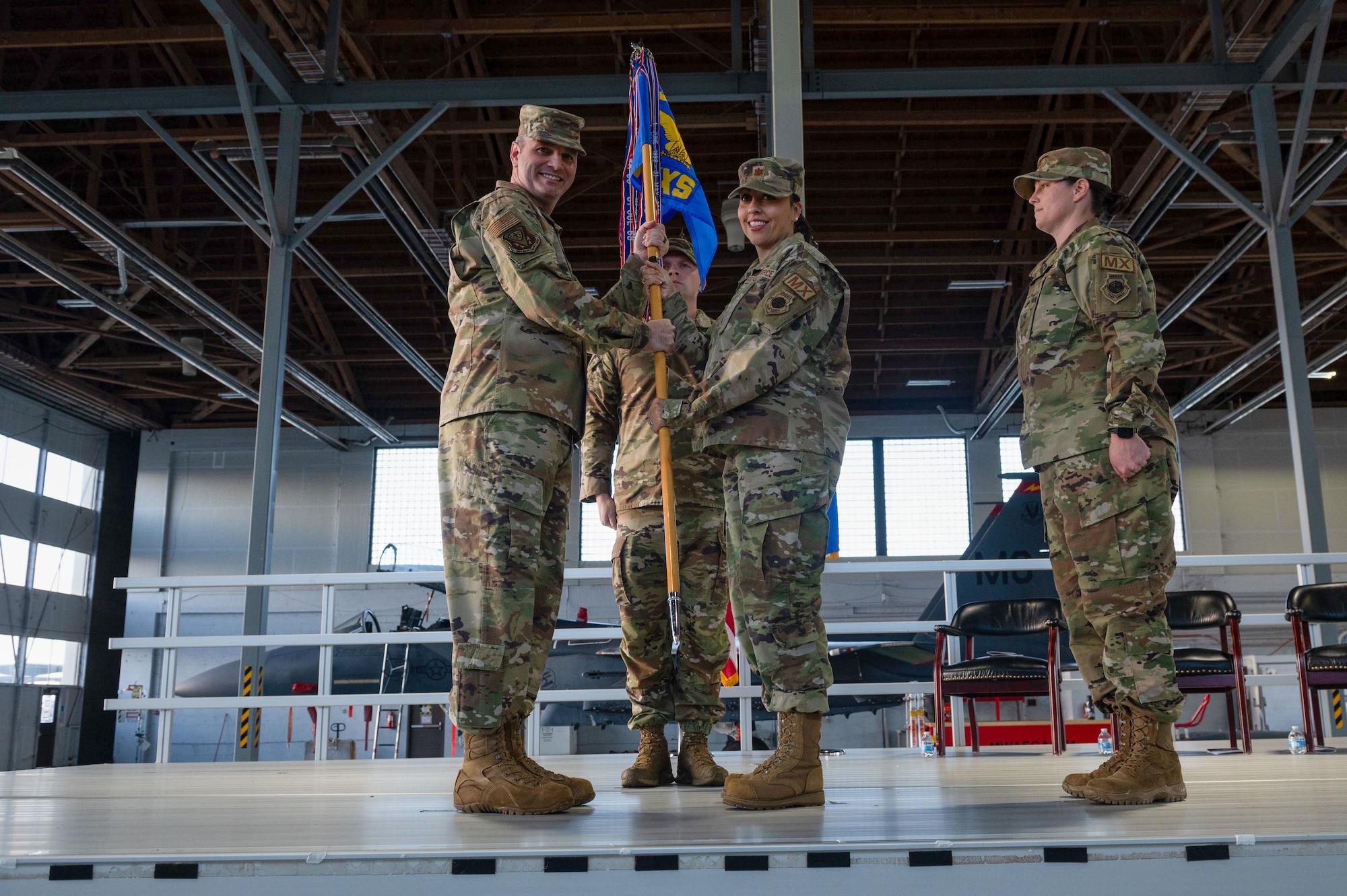 Commander passes the guidon of the squadron