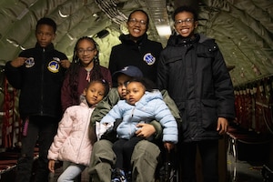 The Hawkins family take a group photo during “Pilot for a Day” at Joint Base Andrews