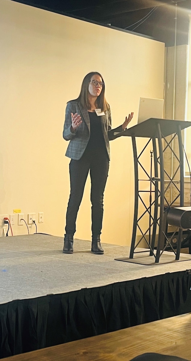 Dr. Lisa Rueschhoff, a materials research engineer based in the Air Force Research Laboratory, or AFRL’s, Materials and Manufacturing Directorate, delivers a presentation on sintering-assisted additive manufacturing techniques at the National Science Foundation’s Designing Materials to Revolutionize Our Future, or DMREF, and AFRL 2023 kickoff meeting at the Wright Brothers Institute in downtown Dayton, Ohio, Dec. 7, 2023. Rueschhoff has collaborated on a team of researchers from AFRL, San Diego State University and Clemson University to accelerate the transition of new materials from design to deployment in support of the nation’s warfighters over the next four years. (U.S. Air Force photo)