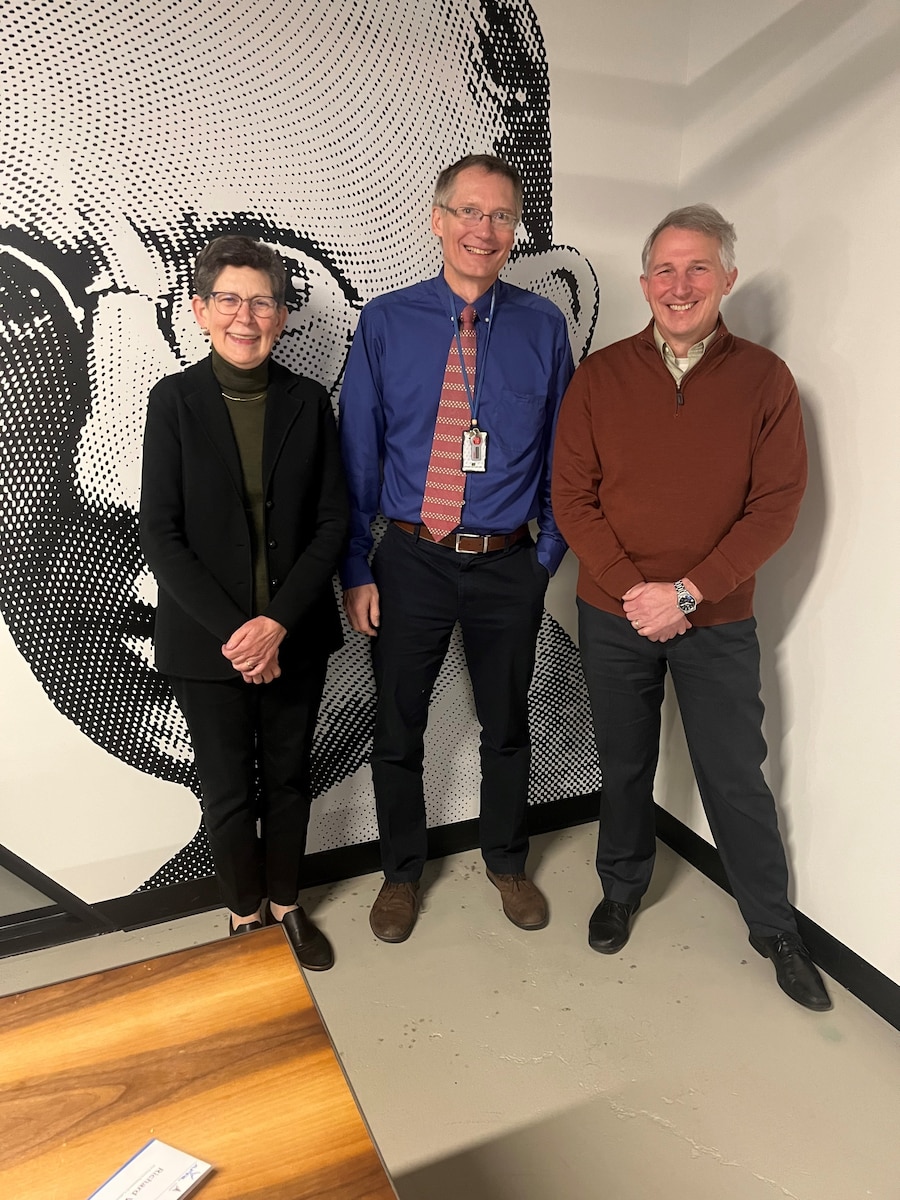 From left: Air Force Research Laboratory, or AFRL, Senior Technologist Dr. Ruth Pachter, who currently holds Emeritus status within AFRL’s Materials and Manufacturing Directorate, stands with Dr. John Schlueter, Designing Materials to Revolutionize Our Future, or DMREF program director, and Dr. Richard Vaia, chief scientist in AFRL’s Materials and Manufacturing Directorate at the National Science Foundation’s DMREF-AFRL kickoff at the Wright Brothers Institute in downtown Dayton, Ohio, Dec. 7, 2023. Pachter and Schlueter’s efforts to rethink interagency partnerships were instrumental in connecting the AFRL workforce with the academic community via the DMREF program, Vaia said. Pachter, with her strong background in materials discovery and development, leveraged her expertise to connect members of AFRL’s workforce across multiple directorates to DMREF project teams with overlapping research interests since 2018. In her Emeritus role, Pachter has sustained these efforts to facilitate the translation of materials discovery to deployment in support of DAF needs. (U.S. Air Force photo)