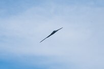 A U.S. Air Force B-2 Spirit stealth bomber assigned to the 509th Bomb Wing, performs a flyover to celebrate the 30th anniversary of its arrival at Whiteman Air Force Base, Mo., Dec. 15, 2023. The revolutionary blending of low-observable technologies with high aerodynamic efficiency and large payload gives the B-2 important advantages over existing bombers. (U.S. Air Force photo by Airman 1st Class Robert E. Hicks)