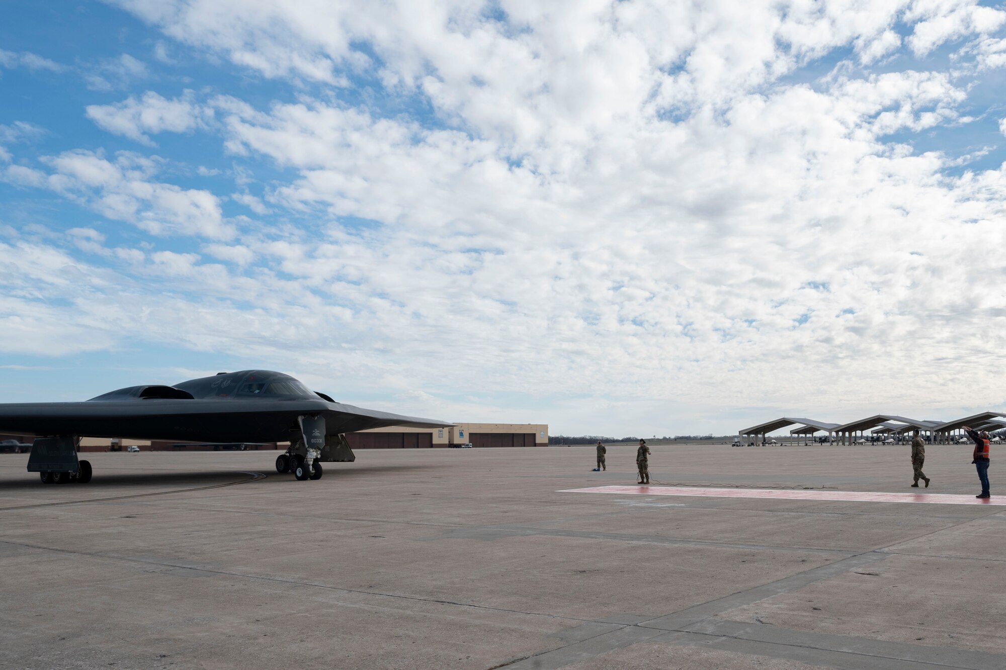 Members of the 509th Bomb Wing conduct post-flight operations for a B-2 Spirit stealth bomber during a ceremony at Whiteman Air Force Base, Mo., Dec. 15, 2023. The ceremony reenacted the delivery of the installation’s first B-2, Spirit of Missouri on Dec. 17, 1993. (U.S. Air Force photo by Tech. Sgt. Anthony Hetlage)