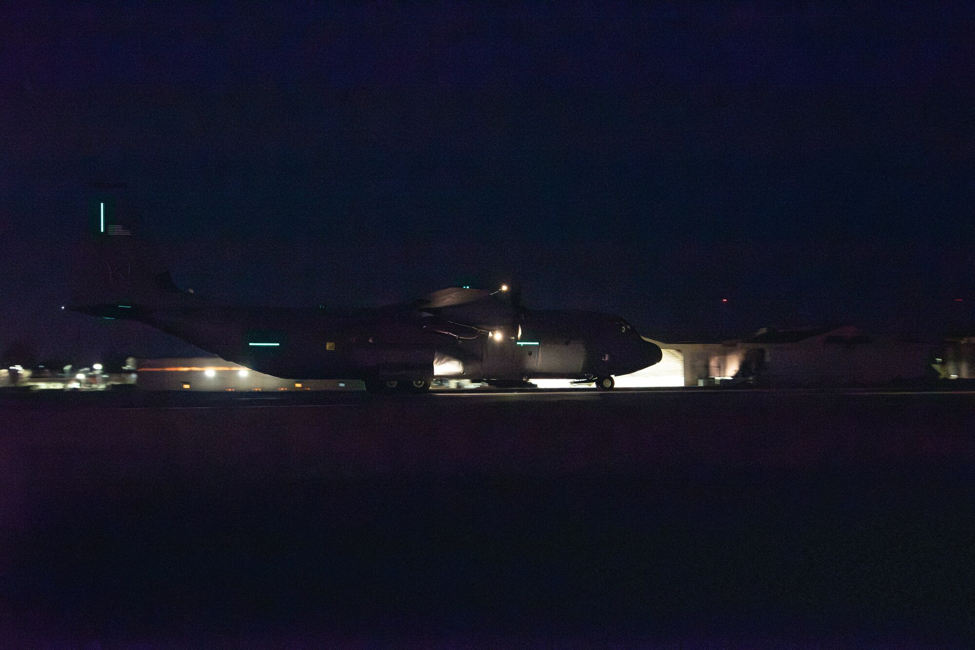 A photo of a C-130J performing airlift operations.