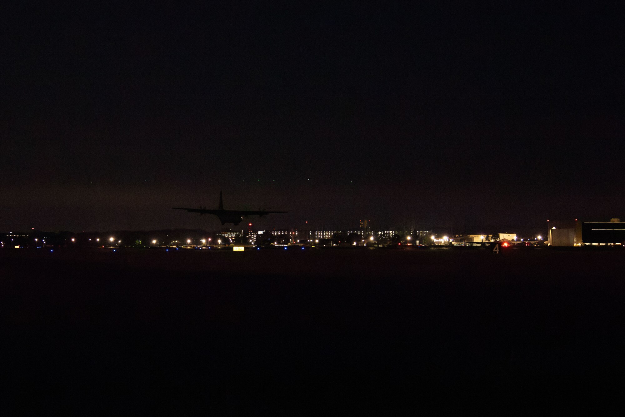 A photo of a C-130J performing airlift operations.