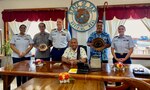 The U.S. Coast Guard delegation stand for a photo with Gov. Hon. Chieng, Lt. Gov. Hon. Itaimi, and Attonery General Gallen in Colonia, Yap, FSM, on Dec. 12, 2023. In a demonstration of continued cooperation, U.S. Coast Guard personnel completed a key leader engagement and site visit in Yap from Dec. 10 to 12. This visit, led by Capt. Nick Simmons, commander of U.S. Coast Guard Forces Micronesia/Sector Guam (CGFM/SG) and the Compact of Free Association (COFA) team, highlighted the enduring partnership and mutual respect between the U.S. Coast Guard and the Yapese community. (U.S. Coast Guard photo)