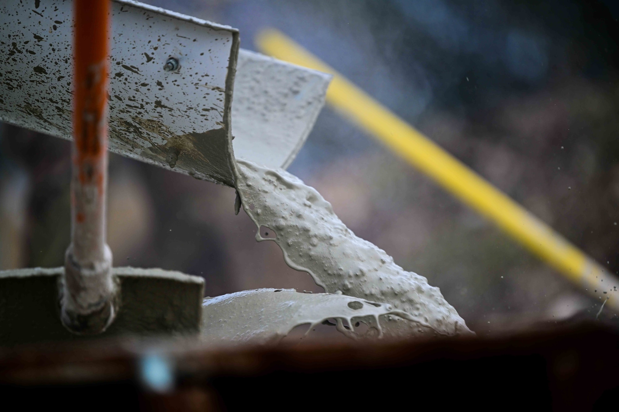 Concrete is poured during a training exercise.
