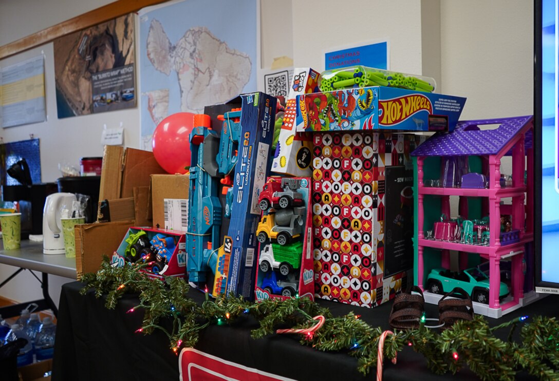 U.S. Army Corps of Engineers first responders aiding with the Hawaii Wildfires combined federal, state, and local response collected more than 70 toys to donate to a Maui toy drive to benefit local children impacted by the disaster.