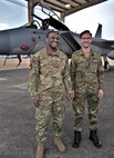 Capt. Philipp Lukas, right, of the German Reserve Air Force, and Capt. Dewayne Pittman of the 142nd Aircraft Maintenance Squadron, Oregon Air National Guard, pose in front of a 142nd Wing F-15C Eagle at the Portland Air National Guard Base, Portland, Ore. The two officers participated in an exchange program sending Lukas to Oregon and Pittman to Germany.