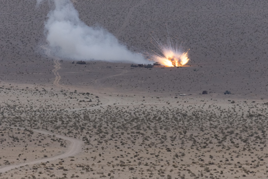 Artillery rounds fired from an M777 towed 155 mm howitzer assigned to the 11th Marine Regiment, 1st Marine Division, impact the target area during the live-fire exercise portion of Expeditionary Warfare Training Group’s Tactical Air Control Party course at Marine Corps Air Ground Combat Center Twentynine Palms, California, Dec. 19, 2023. EWTGPAC’s TACP course trains joint and coalition officer and enlisted personnel to conduct terminal attack control of close air support. (U.S. Marine Corps photo by Lance Cpl. Samantha Devine)