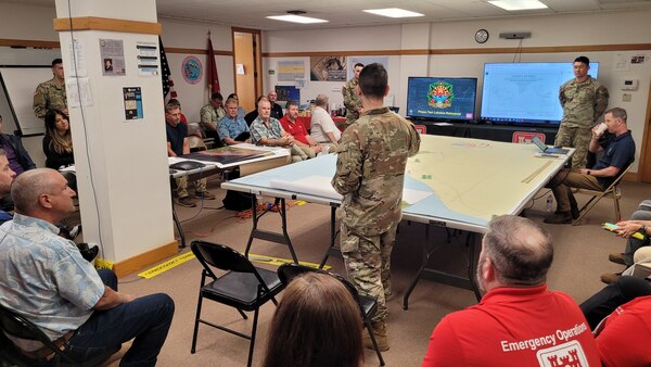 Recovery Field Office members conduct a Rehearsal of Concept for Phase 2 of the Lahaina wildfire mission. The RFO serves as a mini district and an extension of the affected district. Operations, mission management, logistics, public affairs, internal review, and others operate and are housed in the RFO.