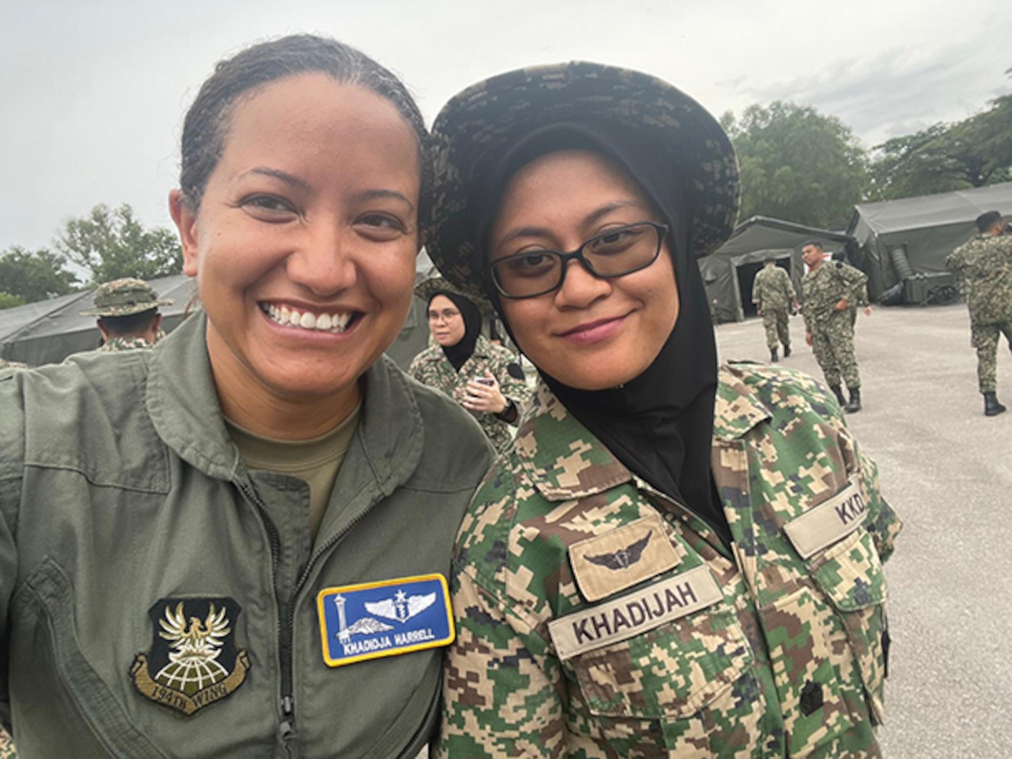 Lt. Col. Khadidja Harrell, a flight surgeon with the 194th Medical Group poses for a photo with her Malaysian counterpart during Indo-Pacific Military Health Exchange (IPMHE) from Sept. 26-29, 2023, in Kuala Lumpur, Malaysia.