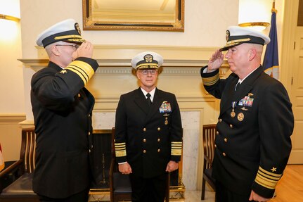 Adm. Daryl Caudle, commander, U.S. Fleet Forces Command, center, looks on as Vice Adm. Robert Gaucher, left, relieves Vice Adm. William Houston, right, during the Commander, Submarine Forces change of command ceremony onboard Naval Station Norfolk, Dec. 28.