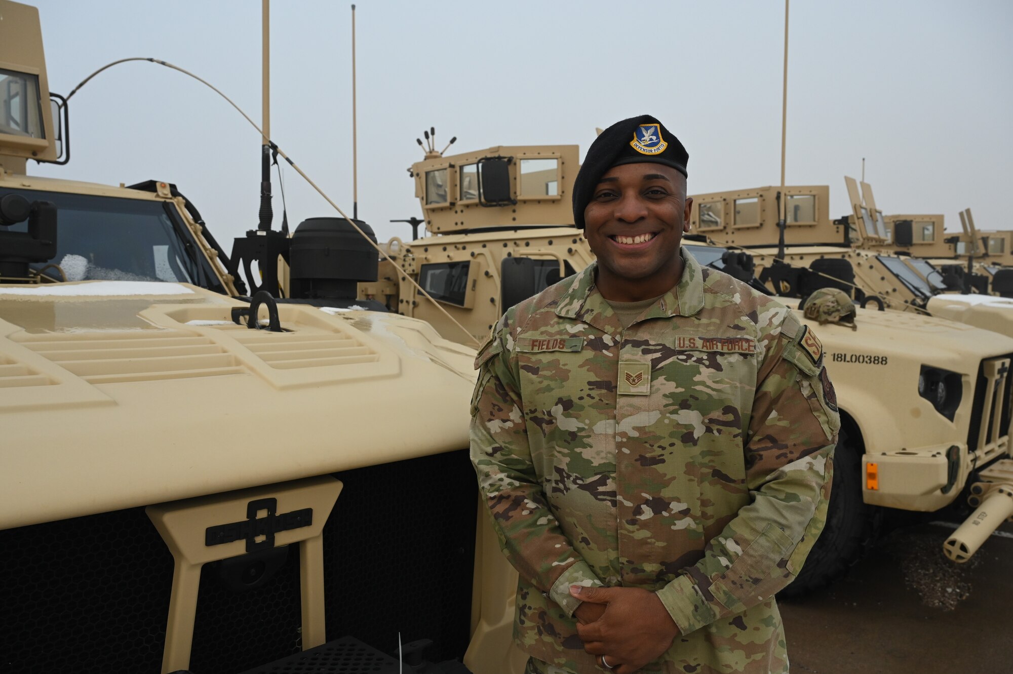 A security forces Airman poses for a photo