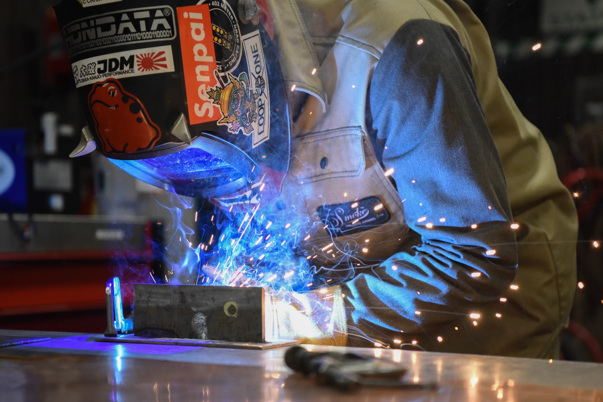 U.S. Air Force Staff Sgt. Clement Chhay, 51st Maintenance Squadron metals technology craftsman, practices welding a T-joint at Osan Air Base, Republic of Korea, Dec. 22, 2023. Metals technicians from the 51st MXS ensure aircraft components meet required specifications and standards, enabling the 51st Fighter Wing jets to fight anytime, anywhere. (U.S. Air Force photo by Senior Airman Brittany Russell)