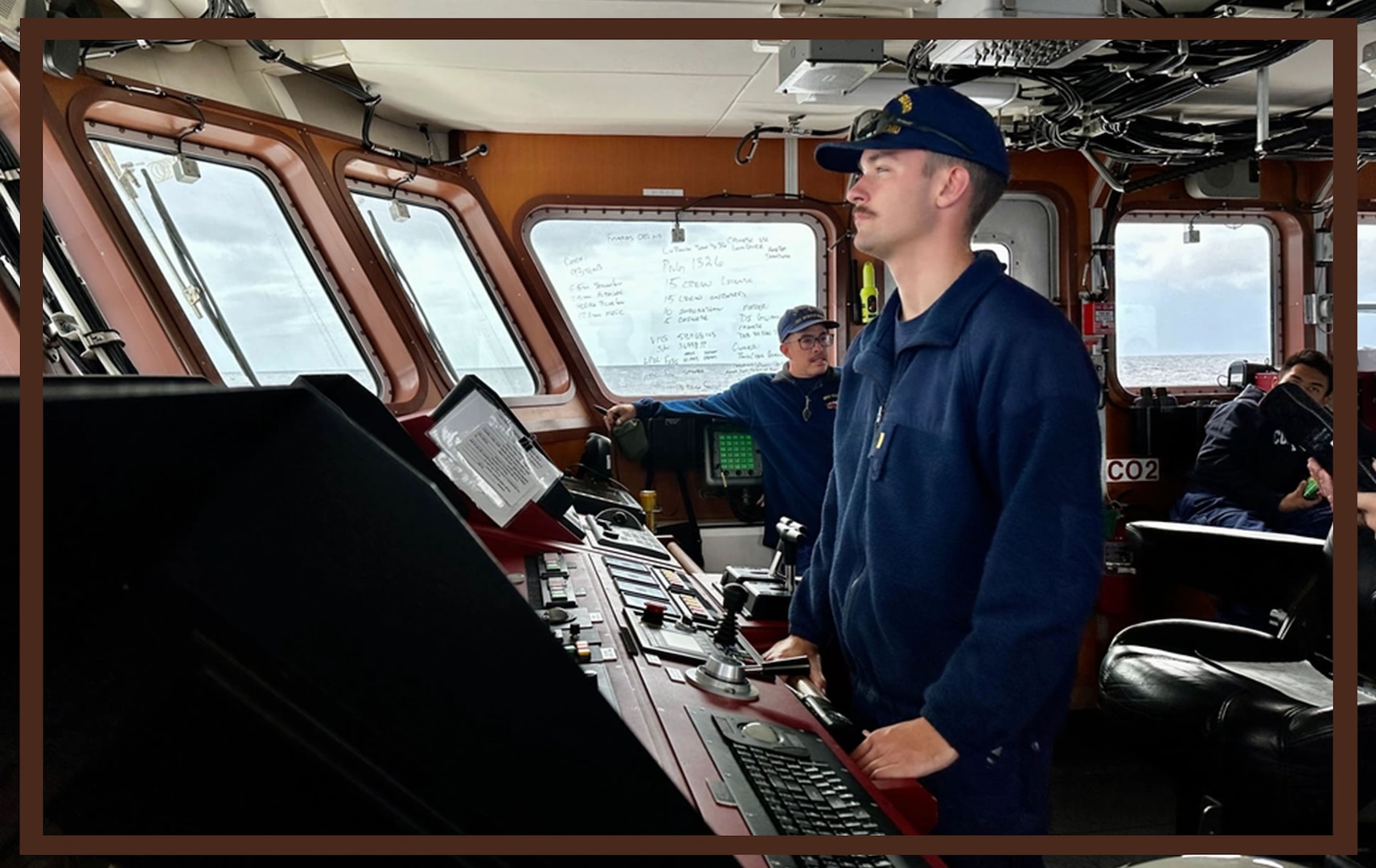 Ensign Peyton Phillips at the helm of USCGC Myrtle Hazard (WPC 1139) in the Coral Sea off Papua New Guinea on Aug. 23, 2023. The U.S. Coast Guard was in Papua New Guinea at the invitation of the PNG government to join their lead in maritime operations to combat illegal fishing and safeguard marine resources following the recent signing and ratification of a bilateral maritime law enforcement agreement between the United States and Papua New Guinea. (U.S. Coast Guard photo by Chief Warrant Officer Sara Muir)