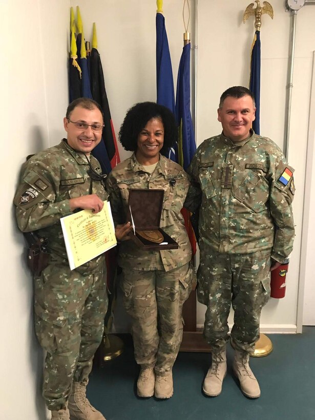 Jacqueline Moses poses for a photo while on base in Kandahar, Afghanistan where she served as a logistics management specialist for three years.