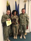 Jacqueline Moses poses for a photo while on base in Kandahar, Afghanistan where she served as a logistics management specialist for three years.