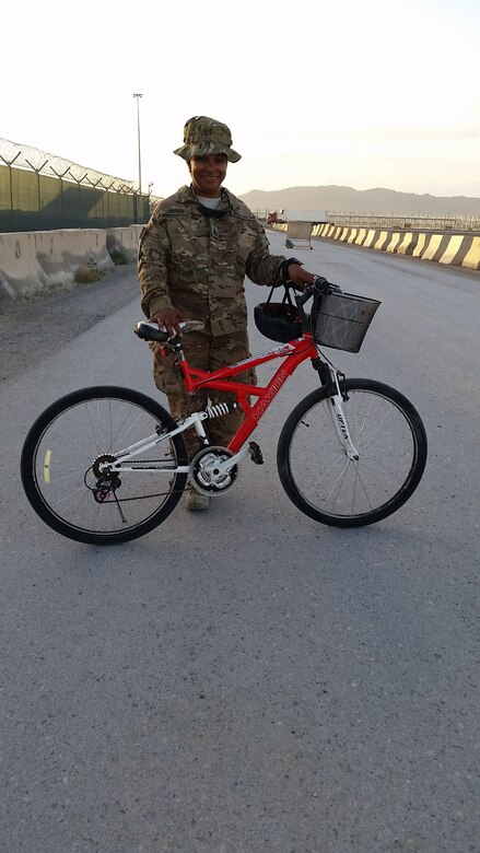 Jacqueline Moses poses for a photo while on base in Kandahar, Afghanistan where she served as a logistics management specialist for three years.