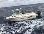 An interdicted migrant vessel near Hollywood, Florida, Dec. 24, 2023. U.S. Coast Guard Cutter William Flores' crew transferred 12 migrants to Bahamas, Dec. 29, 2023. (U.S. Coast Guard photo)