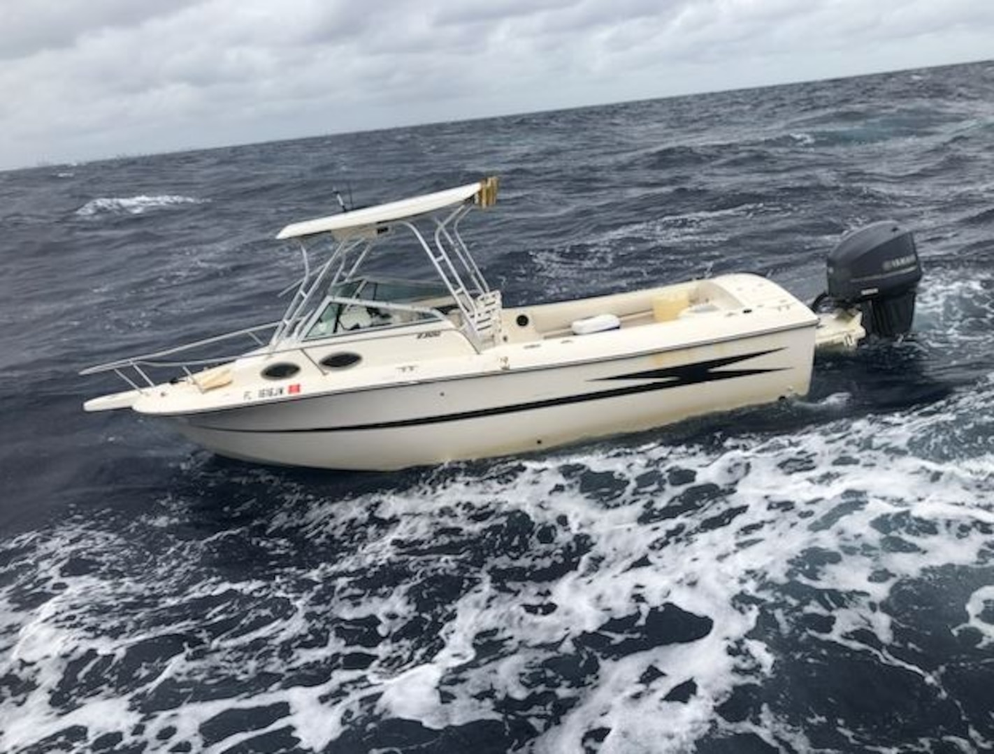 An interdicted migrant vessel near Hollywood, Florida, Dec. 24, 2023. U.S. Coast Guard Cutter William Flores' crew transferred 12 migrants to Bahamas, Dec. 29, 2023. (U.S. Coast Guard photo)