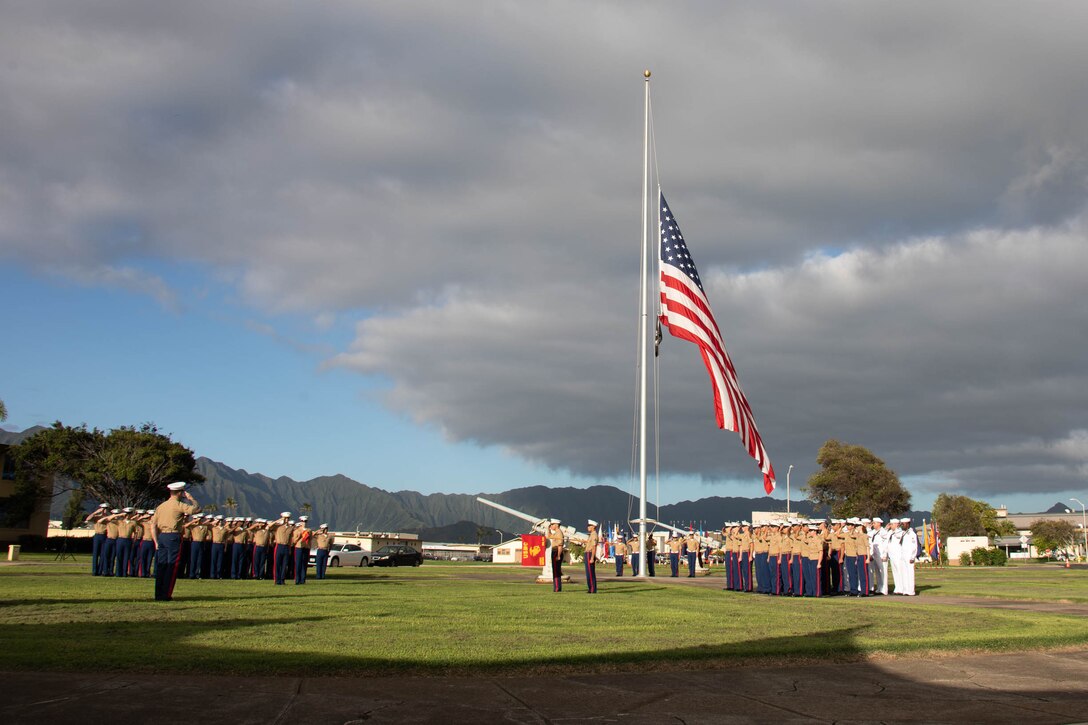 U.S. Marines with Headquarters Battalion, Marine Corps Base Hawaii, stand in formation during the 2023 Klipper Ceremony, MCBH, Dec. 7, 2023. The Klipper Memorial was dedicated in 1981 to honor the 17 U.S. Navy Sailors and two civilian contractors who died during the attack on Naval Air Station Kaneohe Bay on Dec. 7, 1941. (U.S. Marine Corps Photo by Lance Cpl. Tania Guerrero)